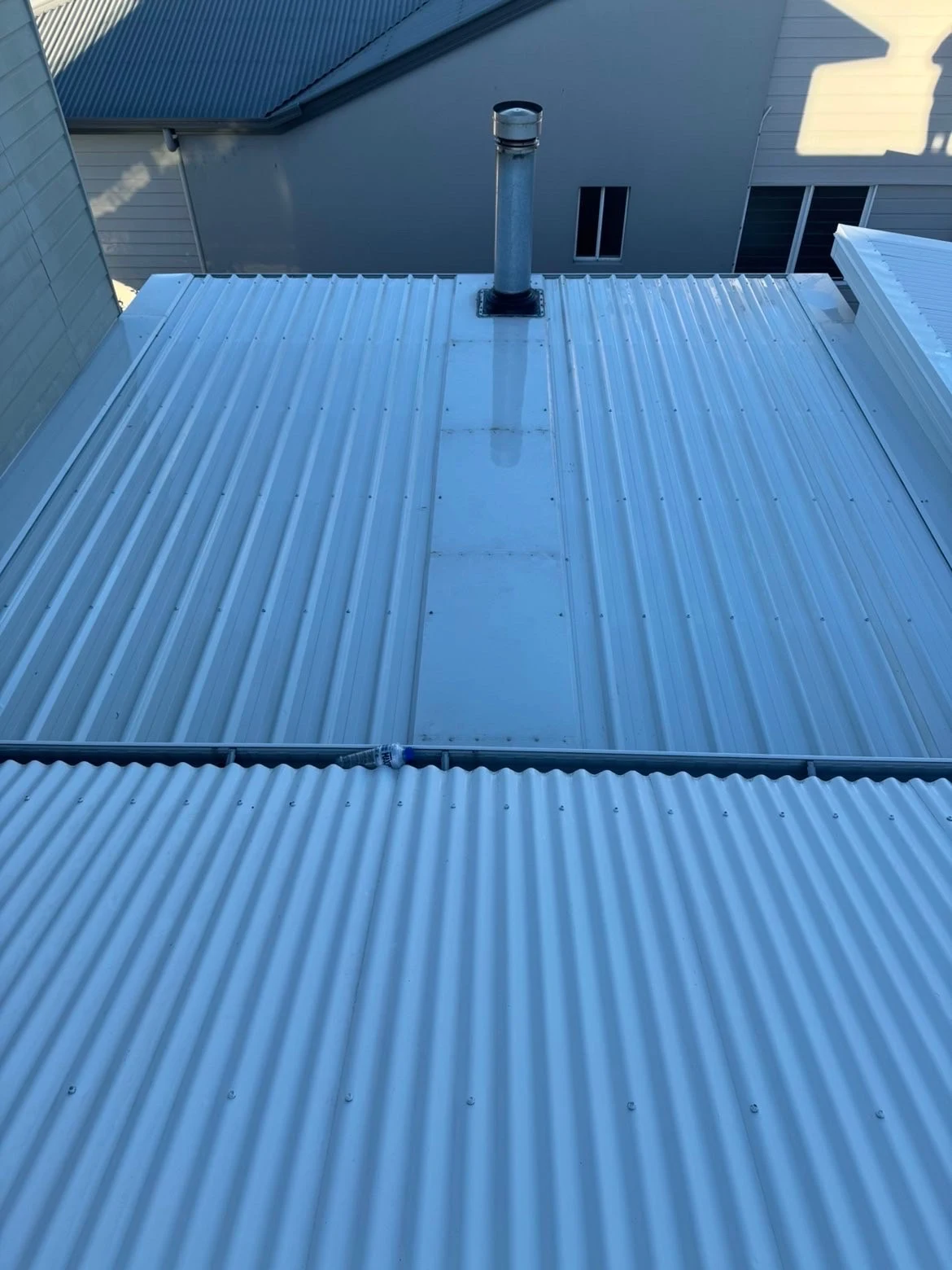 Freshly cleaned metal roof on the Sunshine Coast